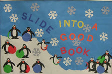 Slide Into A Good Book! Penguin Winter Bulletin Board Idea