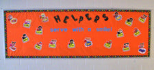 "Helpers Serve With A Smile!" Superhero Themed Bulletin Board